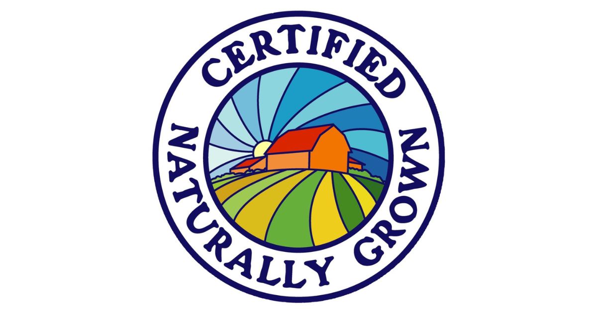 Certified Naturally Grown logo featuring a red barn, green fields, and a rising sun with rays in the background, encircled by the text 'CERTIFIED NATURALLY GROWN'.