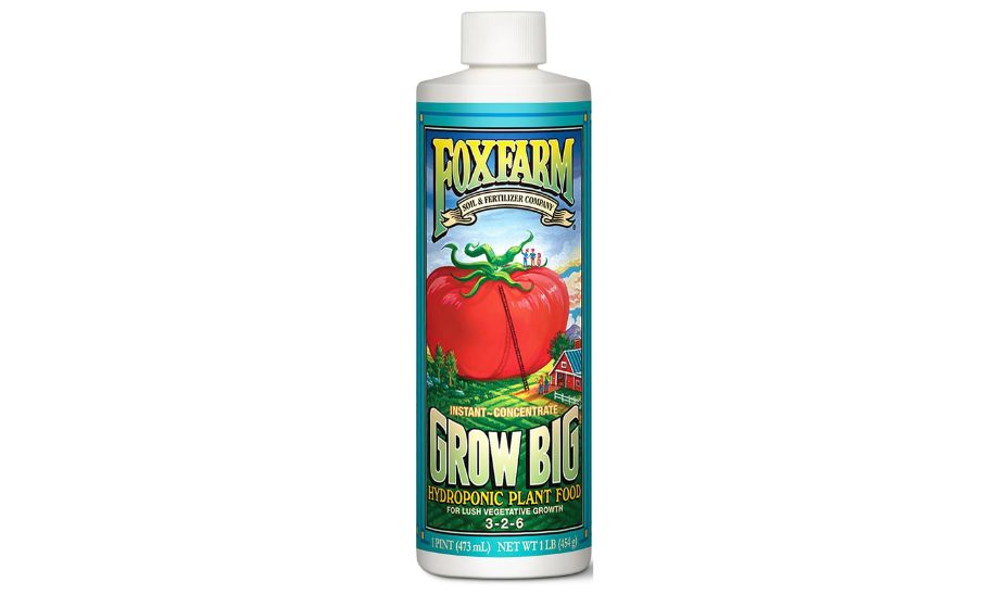 A bottle of FoxFarm Grow Big Hydroponic Plant Food. The label features a large red tomato with a farm scene in the background. The text on the label reads 'FoxFarm Soil & Fertilizer Company,' 'Instant Concentrate,' 'Grow Big,' 'Hydroponic Plant Food,' 'For Lush Vegetative Growth,' and '3-2-6.' The bottle size is indicated as 1 pint (473 mL) and net weight 1 lb (454 g).