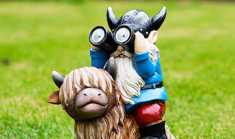 Resin garden gnome statue sitting on a Highland cow, adorned with solar lights and an outdoor telescope, perfect as a whimsical gift for yard and patio decor.